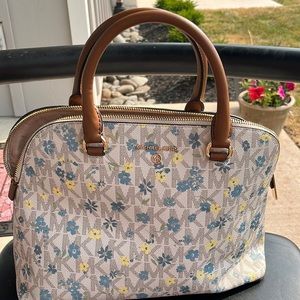 Michael kors pocketbook with flowers blue and yellow 8 “ high by 12 “ long